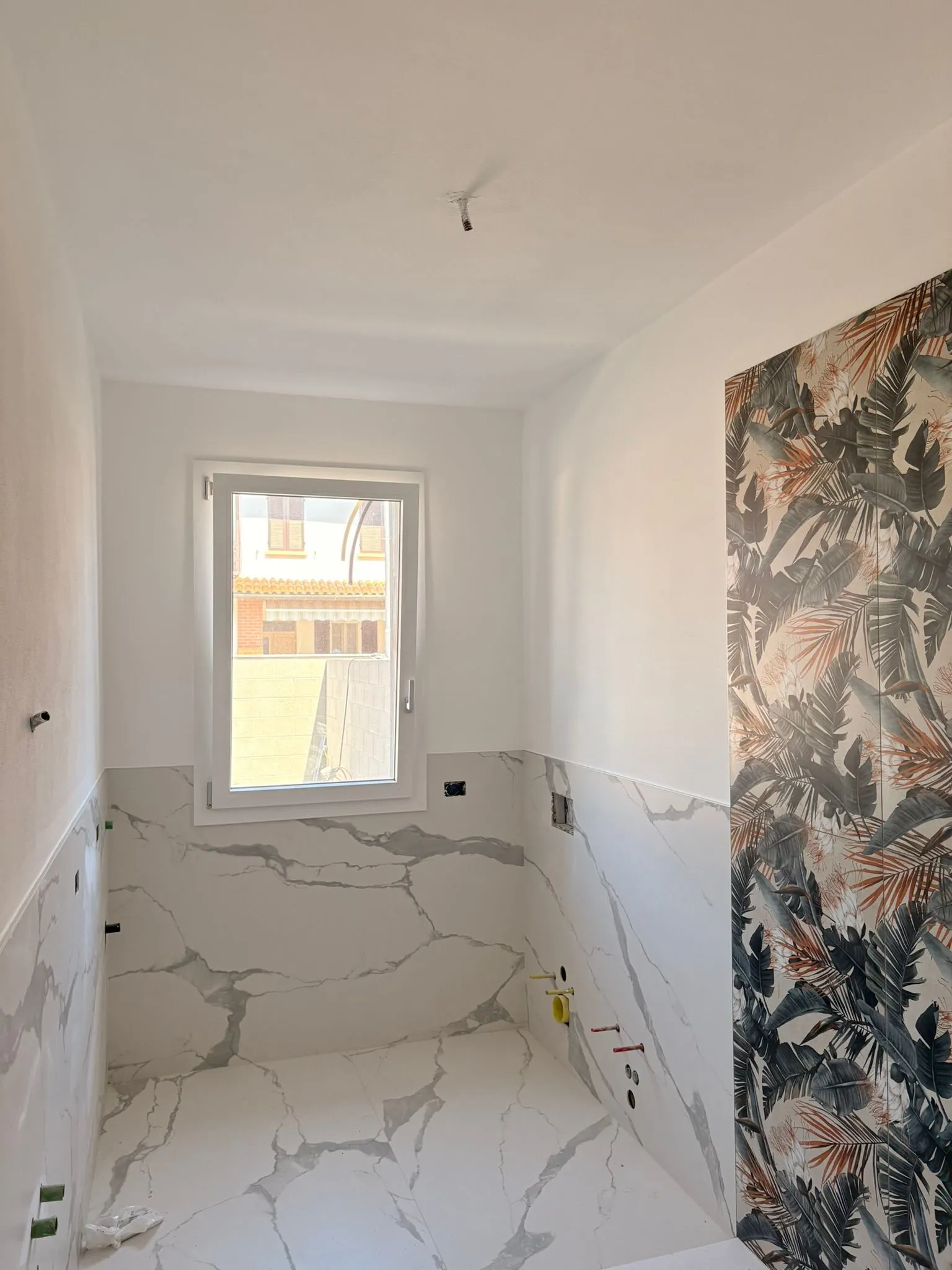 Posa carta da parati e decori Novara 1